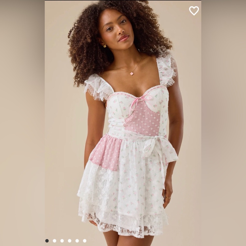 Altar'd State Pink and White Floral Mini Dress with lace accents throughout.